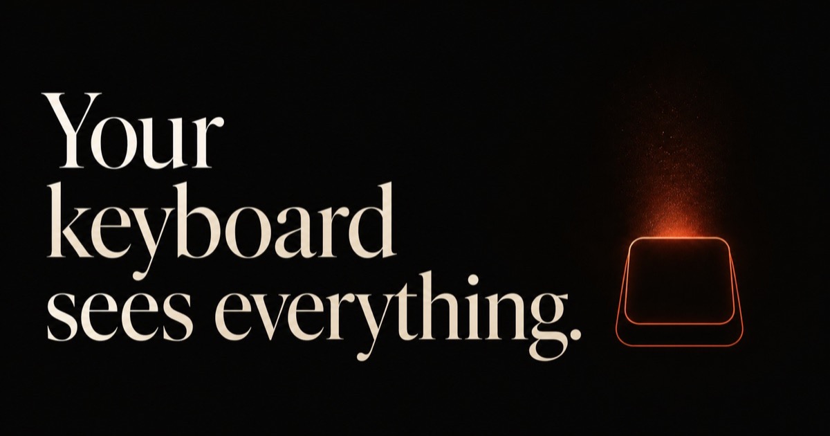 A phone keyboard glowing softly against a dark background, keys catching a warm ember light